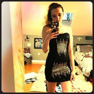 A gorgeous small black fitted dress